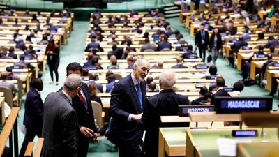 Bashar al-Ja'afari, second right, Syria's Ambassador to the United Nations, talks with Ibrahim al-Eshaiker al-Jaafari, right, Iraq's Foreign Minister, on the sidelines of the Nelson Mandela Peace Summit during the 73rd session of the General Assembly of the United Nations at United Nations Headquarters in New York. EPA