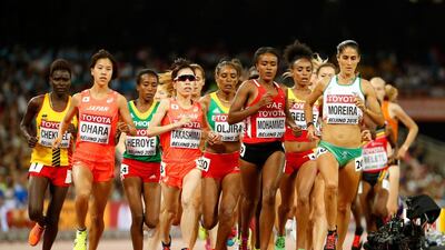 The UAE’s Alia Saeed, centre, was with the front pack early the 10,000-metre event, but after three quarters of the race was run she withdrew. Christian Petersen / Getty Image