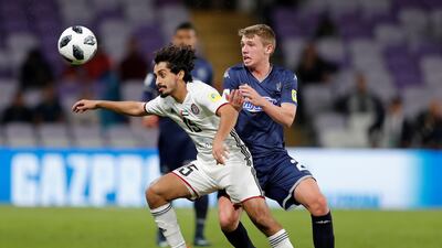 Auckland City’s Callum McCowatt in action with Al Jazira’s Khalfan Mubarak. Reuters