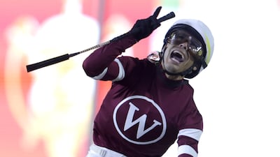 Jockey Jose Ortiz celebrates after winning the Dubai World Cup on Magnitude. EPA