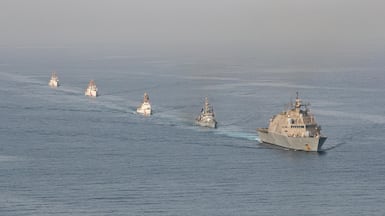 US Navy and Coast Guard ships in the Strait of Hormuz. Iran is prepared to reopen the strait if the US eases military pressure, an Iranian official said. Photo: US Naval Forces Central Command