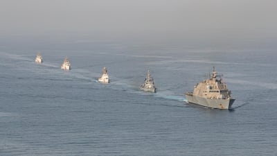 US Navy and Coast Guard ships participates in a photo exercise while transiting the Strait of Hormuz. Photo: US Naval Forces Central Command