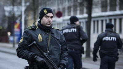A police officer guards the street around the Noerrebro train station in Copenhagen where a gunman suspected of attacks on a cultural centre and synagogue was shot dead by police. AFP PHOTO / CLAUS BJORN LARSEN