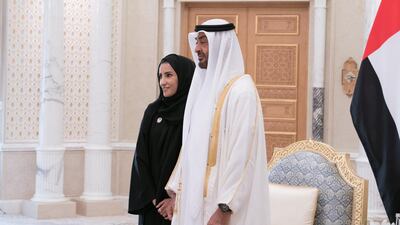 Sheikh Mohamed bin Zayed and Sara Awad Issa Musallam stand for a photograph at the swearing-in ceremony. Ministry of Presidential Affairs