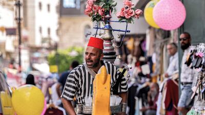 A Palestinian street vendor at a market in the old city of Bethlehem in the occupied West Bank. AFP