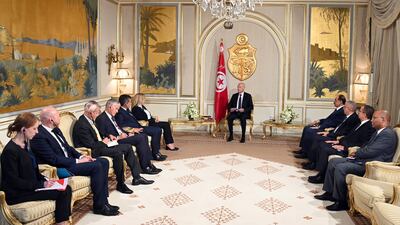 Tunisian President Kais Saied, centre, addresses guests including French Interior Minister Gerald Darmanin and German Interior Minister Nancy Faeser at the Presidential Palace in Carthage. AP
