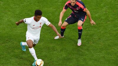 Liverpool's Joe Gomez dribbles around Bordeaux's Enzo Crivelli during their Europa League contest on Thursday night. Mehdi Fedouach / AFP