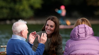 Catherine, Duchess of Cambridge, speaks to Ike Alter and Diane Stoller aboard a boat on Lake Windermere. The Duchess heard the moving stories of Holocaust survivors who as children were sent to the British beauty spot to recuperate from the horrors of the Nazi regime. Getty Images