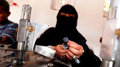 Safa al-Faqih crafts a stone in the old city of the capital, Sanaa, on April 18, 2018. Mohammed Huwais / AFP Photo
