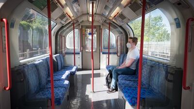 A lone passenger on the Central Line in London. PA