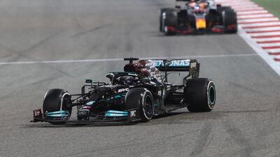 Mercedes driver Lewis Hamilton steers his car followed by Red Bull driver Max Verstappen. AP