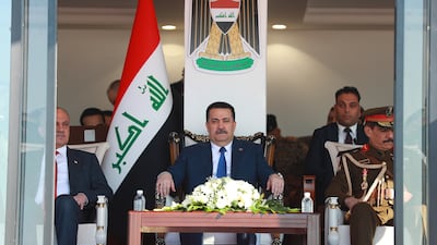 Iraqi Prime Minister Mohammed Shia Al Sudani, centre, observes the 105th Iraqi Army Day celebrations in Baghdad. Getty Images