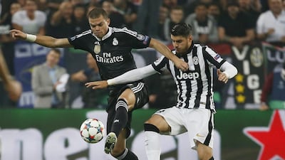 Real Madrid's Pepe vies for the ball with Juventus' Stefano Sturaro during their Champions League semi-final first leg match. Sergio Perez / Reuters