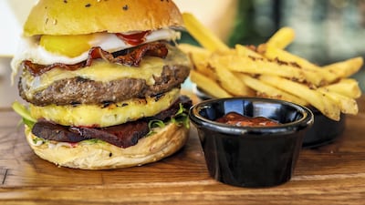 A True Blue Aussie burger is available at Jones the Grocer outlets across the UAE for a limited period. Courtesy Jones the Grocer