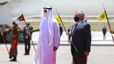 Sheikh Mohamed bin Zayed is met by King Abdullah II at Marka Military Airport in Jordan. Courtesy Royal Hashemite Court