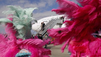 French President Emmanuel Macron and his wife Brigitte Macron disembark from a plane at Louis Armstrong New Orleans International Airport in Kenner, Louisiana. AFP