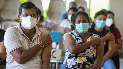 People recieve the second dose of the Russian Sputnik V Covid-19 vaccine in Colombo, Sri Lanka. EPA