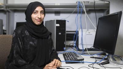 Mouza Shemaili, an Emirati research assistant, in a laboratory at Khalifa University’s campus in Sharjah. Sarah Dea / The National