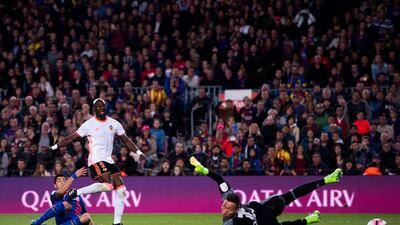 Luis Suarez of Barcelona scores his team’s first goal. Alex Caparros / Getty Images
