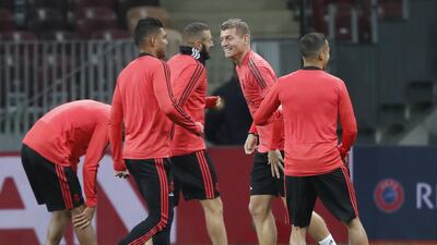 Kroos, centre, attends training session. EPA