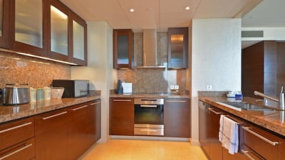 The kitchen of the three-bedroom apartment in the Burj Khalifa. Courtesy Better Homes