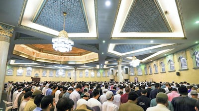 Prayers at the Masjid Bani Hashim mosque. Victor Besa/The National