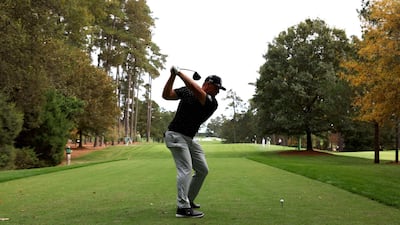Bryson DeChambeau plays his shot from the second tee. AFP