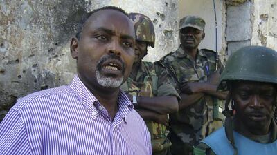 Mohamoud Nur, left, was mayor of Mogadishu, and a bit of a national celebrity, from 2010 to 2014. Kathrine Houreld / AP Photo