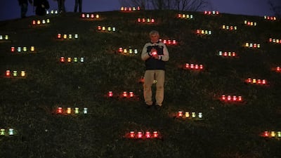 A man attends a commemoration ceremony on November 28, 2015, at a monument for Holodomor victims marking the 82nd anniversary of the famine of 1932-33 in which millions died of hunger in Kiev, Ukraine. Gleb Garanich / Reuters