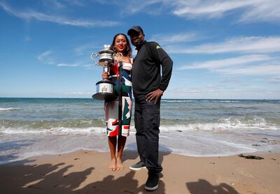 World No 1 Naomi Osaka poses with her father Leonard Francois after winning the Australian Open last month. Aly Song / Reuters