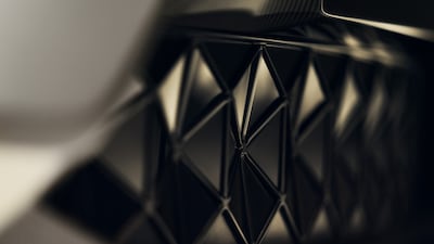 A grille detail on the car.