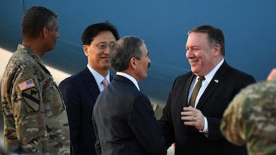 U.S. Secretary of State Mike Pompeo is greeted by U.S. Ambassador to South Korea Harry Harris upon his arrival at Osan Air Base in Pyeongtaek, South Korea. Reuters