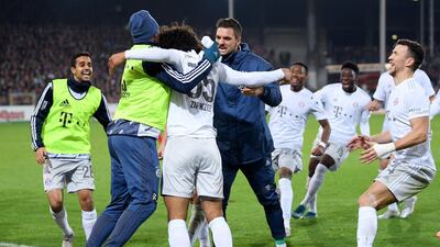 Zirkzee celebrates with team-mates after his late goal. Getty