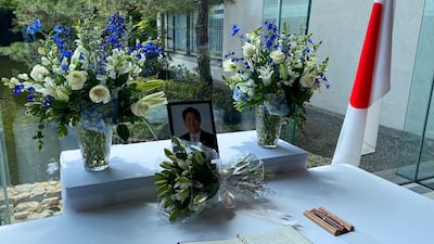 Mr Biden's signature in a condolence book for Mr Abe. Reuters