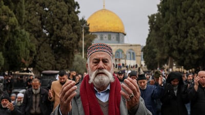 Palestinian Muslims pray at Al Aqsa Mosque compound in Jerusalem's Old City before the first Friday noon prayer of Ramadan 2025. AFP