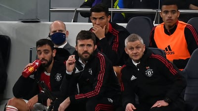 Ole Gunnar Solskjaer, right, has been sacked as Manchester United manager with Michael Carrick, centre, placed in temporary charge. AFP