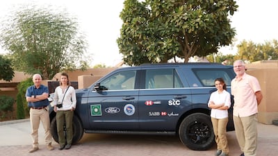 The Heart of Arabia team - Mark Evans MBE, Ana-Maria Pavalache, Reem Philby, and Alan Morrissey - with one of the two support cars they will be taking on the expedition. Photo: Osama Farhan / British Embassy Riyadh