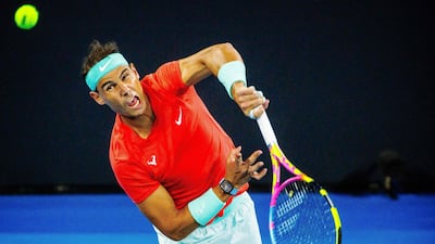 Rafael Nadal serves against Dominic Thiem. AFP