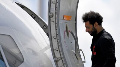 Liverpool's Egyptian star Mohamed Salah boards the plane at John Lennon Airport on Friday before leaving for the Champions League final. AFP