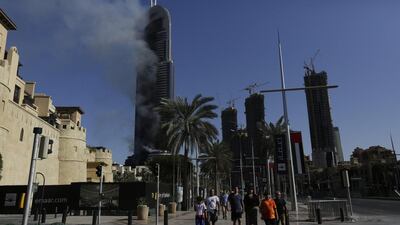 When fire broke out at The Address in Downtown Dubai on New Year’s Eve, the whole world could see the professional and efficient way in which the authorities and ordinary people dealt with the disaster. Sunday Alamba / AP Photo