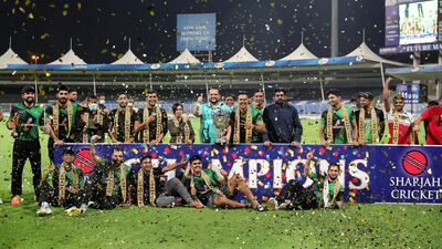 Players of the Future Mattress celebrating with the trophy after winning the Sharjah Ramadan Cup final at Sharjah Cricket Stadium. They beat MGM Cricket Club by 12 runs. All photos by Pawan Singh / The National