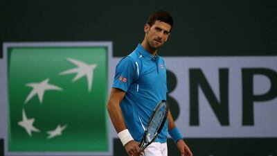Novak Djokovic reacts during his win against Bjorn Fratangelo during their match at the Indian Wells Masters on Sunday. Sean M Haffey / Getty Images / AFP / March 13, 2016