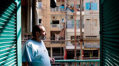 Lebanese-Armenian Dikran Geuzubeuyukian at his house in Beirut's Mar Mikhael district after its renovation by the Armenian General Benevolent Union. AFP