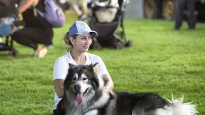 A bonding moment with their pets at the inaugural of Yas Pet Together event at Yas Du Arena, Abu Dhabi. All photos by Leslie Pableo for The National