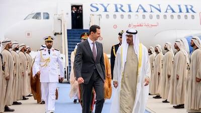 President Sheikh Mohamed receives Syrian President Bashar Al Assad at the Presidential Airport. Presidential Court