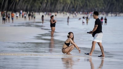 Tourists on the beach.
