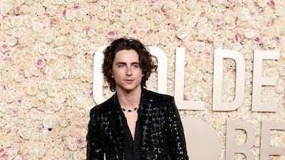 Timothee Chalamet in Celine Homme by Hedi Slimane. Getty Images via AFP