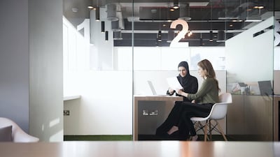 Companies that introduce gender diversity programmes improve their financial performance so they should compensate female mentors that take part. Getty Images