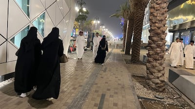 People walk along Riyadh's commercial Tahlia Street. Business activity and new work were affected by the war in March. AFP