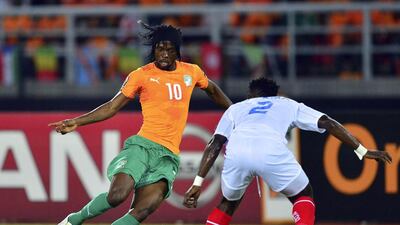 Gervinho, left, of the Ivory Coast takes on Issampa Djos of DR Congo during their African Cup of Nations semi-final at the Bata Stadium in Bata, Equatorial Guinea, on February 4, 2015. Barry Aldworth / EPA